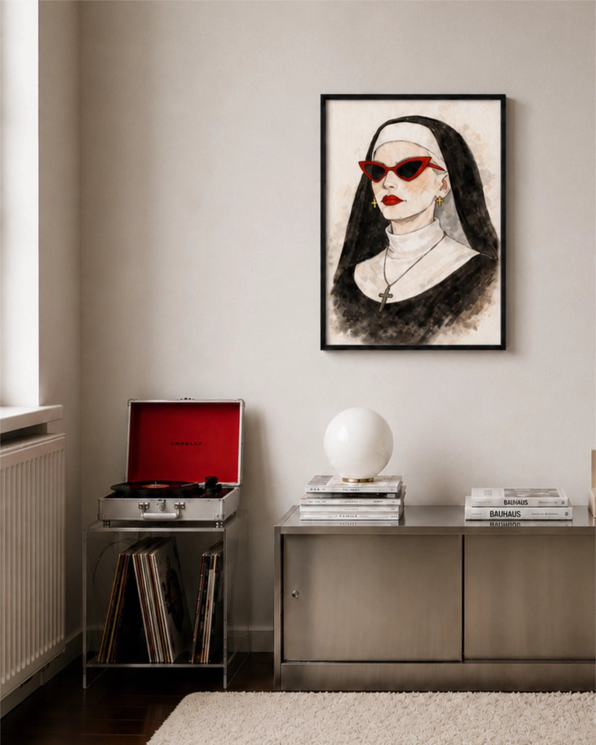 Bad Habit art print framed on a beige wall in a modern styled room with a metal sideboard, a red record player and a white lamp.