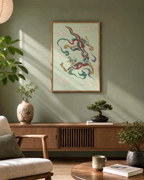 Dragon Dance art print framed in natural wood above a sideboard in a sunlit living room with green walls and Japanese-inspired decor.