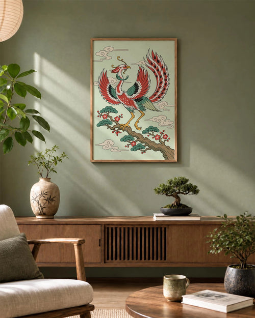Phoenix Bloom art print framed on a soft green wall above a wooden sideboard in a calm, nature-led living room.