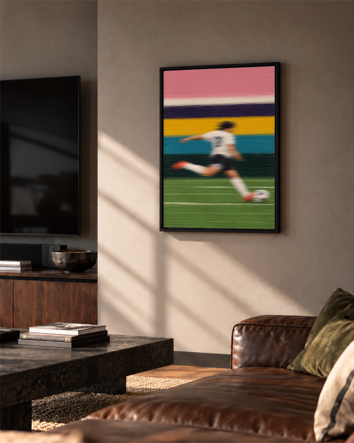 The Final Third art print in a black frame on a sunlit living room wall above brown leather seating.